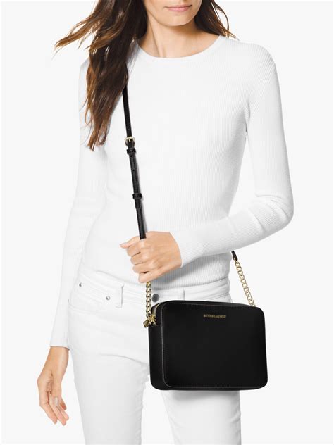 michael kors black and gold crossbody|black crossbody purse Michael Kors.